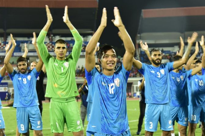 The Indian football team celebrate with the crowd after winning the Intercontinental Cup at the Kalinga Stadium in Bhubaneswar on Sunday