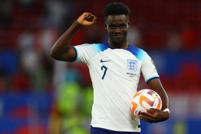 England's Bukayo Saka celebrates with the match ball after scoring a hat-trick against North Macedonia in their UEFA Euro 2024 Qualifier Group C match at Old Trafford, Manchester, on Monday. 