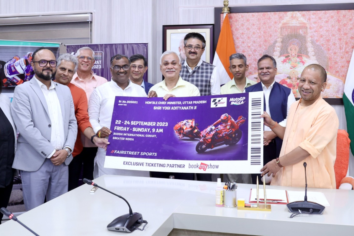Uttar Pradesh Chief Minister Yogi Adityanath unveils the first ticket of MotoGP Bharat to launch online ticket sales of the premier bike race to be held at the Budd Circuit in Greater Noida in September