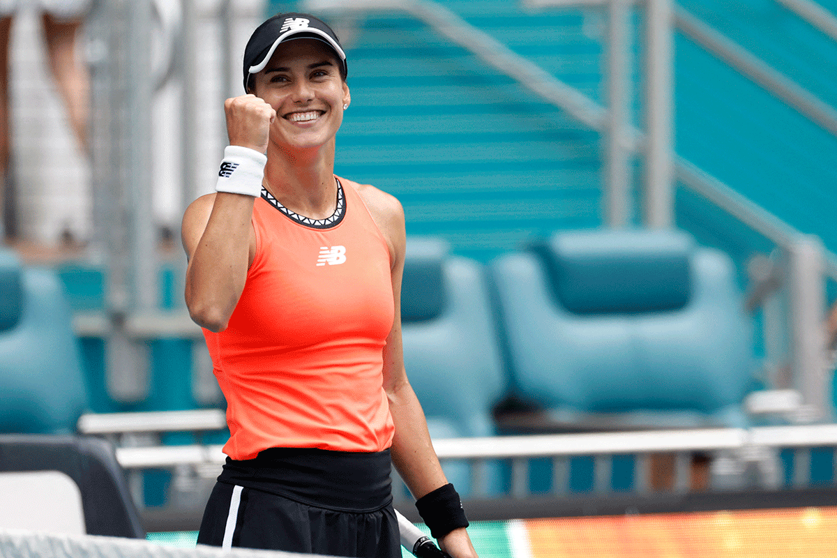 Romania's Sorana Cirstea celebrates after her match against Aryna Sabalenka (not pictured) in a women's singles quarter-final on day ten of the Miami Open at Hard Rock Stadium in Miami, Florida, on Wednesday
