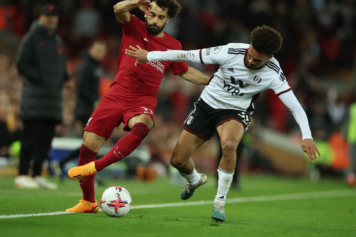 Liverpool's Mohamed Salah in action with Fulham's Antonee Robinson during their match at Anfield in Liverpool