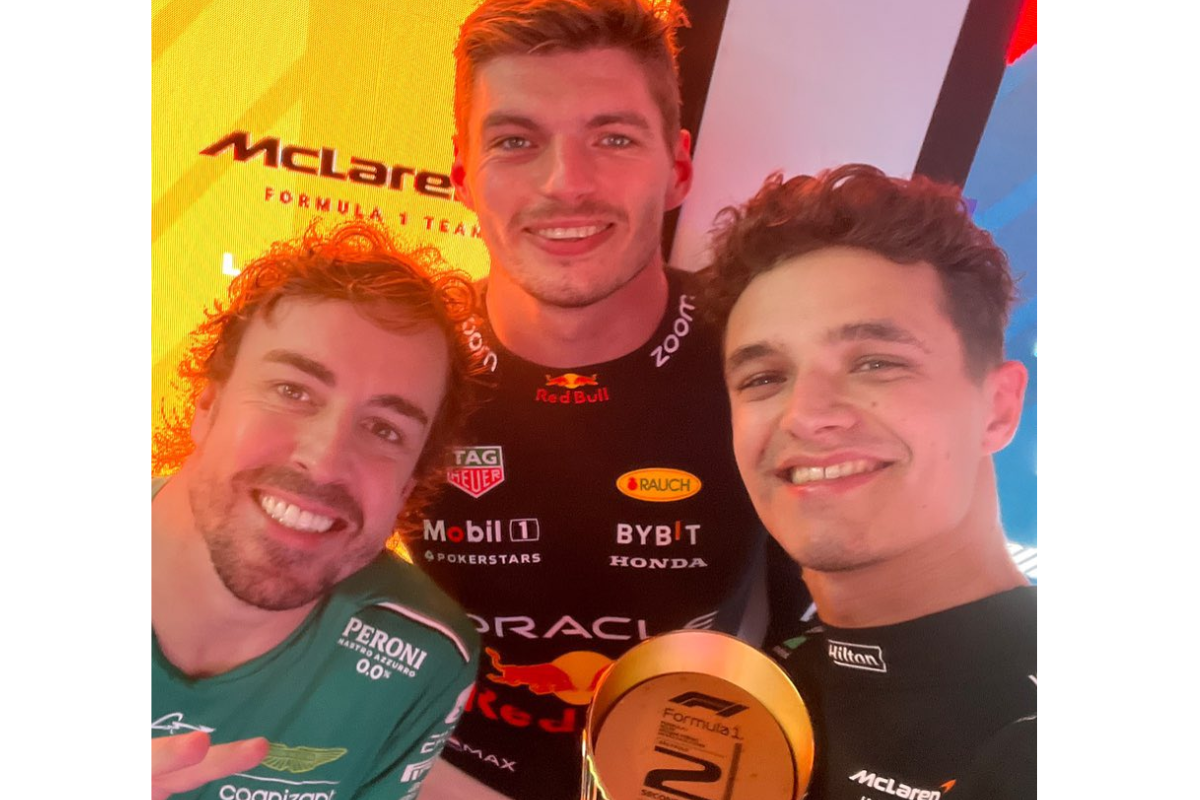 Race winner Max Verstappen, Lando Norris and Fernando Alonso