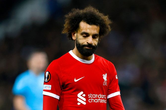 Liverpool's Mohamed Salah wears a dejected look after the match
