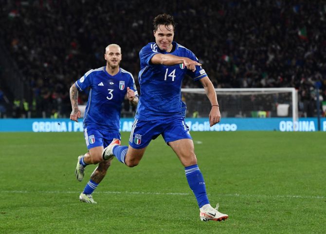 Federico Chiesa celebrates scoring Italy's second goal in the Group C match against North Macedonia, at Stadio Olimpico, Rome.