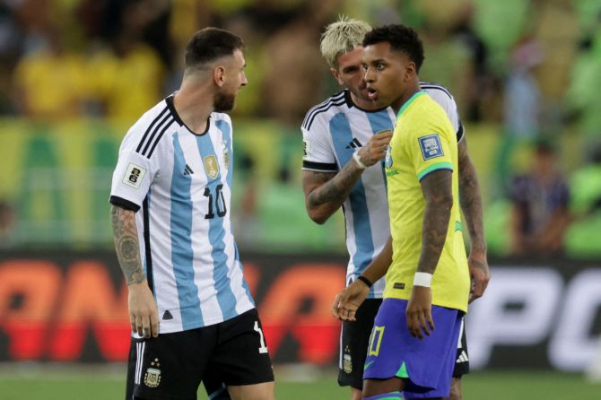 Argentina's Lionel Messi and Brazil's Rodrygo get into an argument before the delayed start to their South American Qualifiers at Estadio Maracana, Rio de Janeiro, Brazil on Tuesday, November 21. 