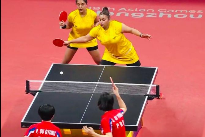Sutirtha Mukherjee and Auhika Mukherjee in action during their quarter-final against North Korea on Monday