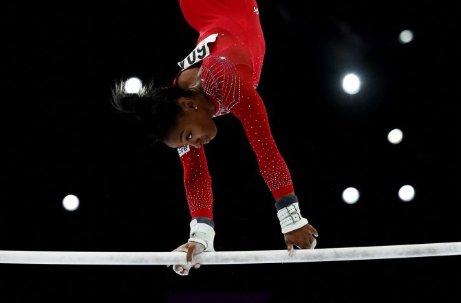 Simone Biles on the uneven bars during the women's apparatus finals