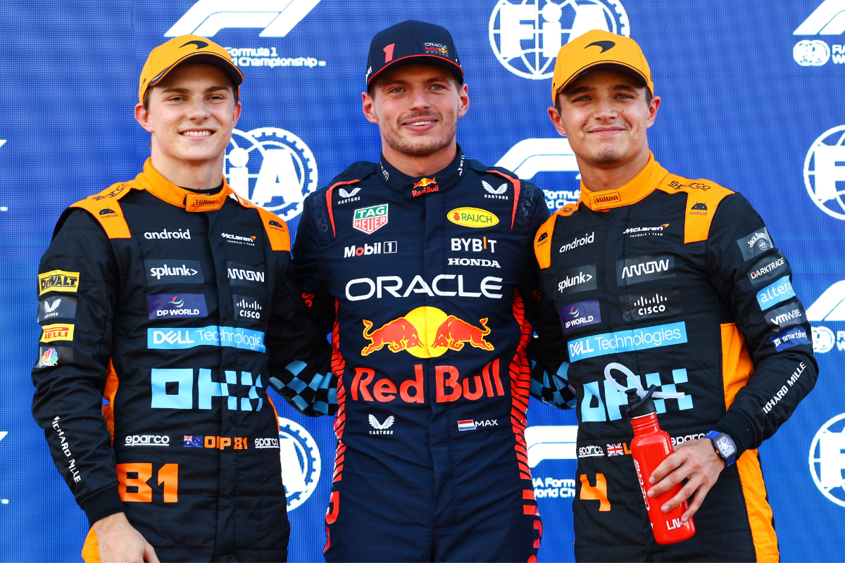 Reb Bull's Max Verstappen (centre) is flanked by McLaren's Oscar Piastri and Lando Norris on the podium after qualifying at the Japanese F1 Grand Prix in Suzuka on Saturday