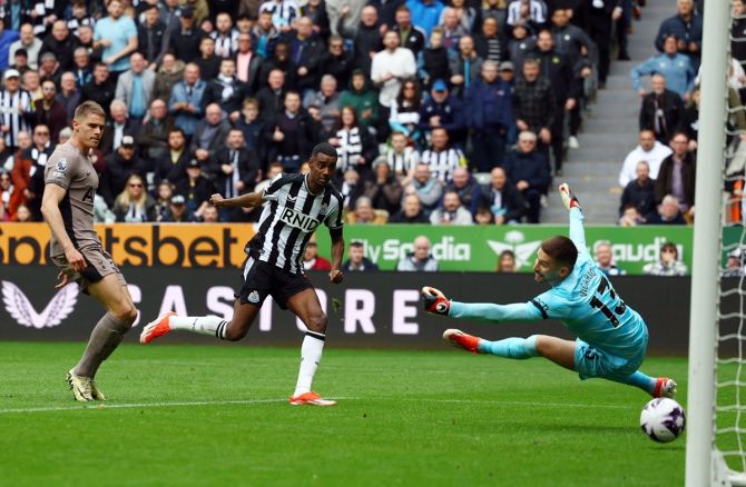 Alexander Isak scores Newcastle United's third against goal Tottenham Hotspur at St James' Park.