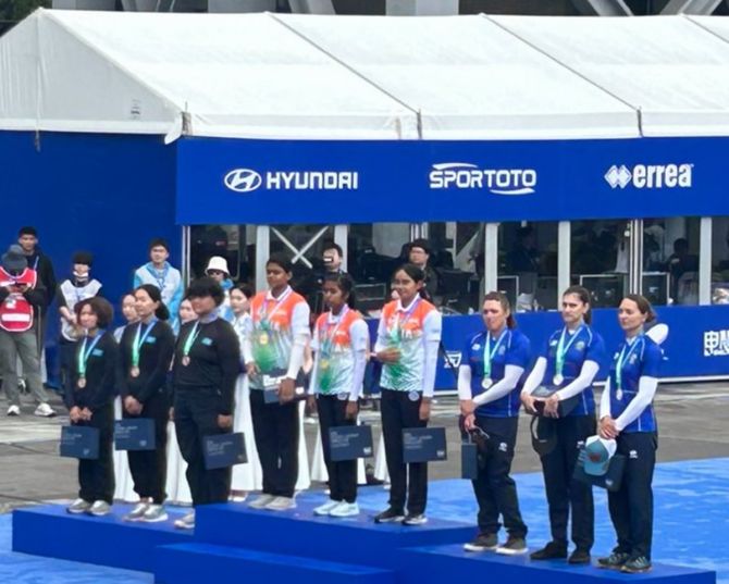 The Indian women’s team of Jyothi Surekha Vennam, Aditi Swami and Parneet Kaur atop the podium after winning the compound gold. at the Archery World Cup Stage 1 in Shanghai on Saturday