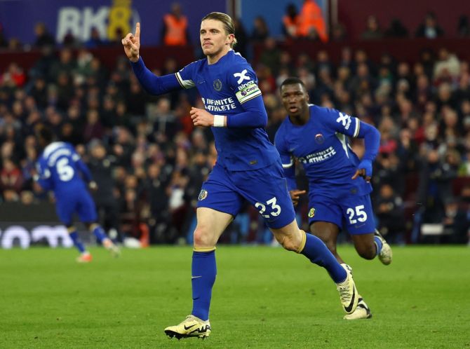 Conor Gallagher celebrates scoring Chelsea's second goal against Aston Villa at Villa Park, Birmingham.