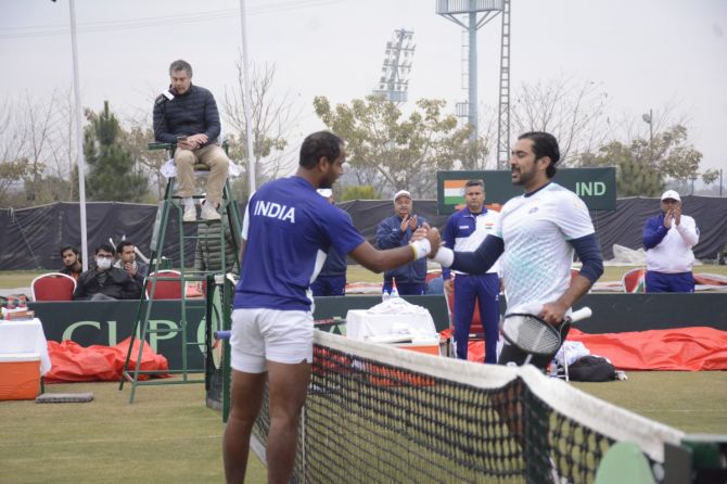 Ramkumar Ramanathan is congratulated by Aisam-ul-haq Qureshi after their Davis Cup tie on Saturday