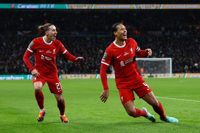 Liverpool's Virgil van Dijk celebrates scoring against Chelsea in extra time during the Carabao Cup, League Cup Final against Chelsea at Wembley on Sunday 