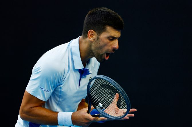 Serbia's Novak Djokovic reacts