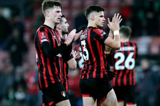 AFC Bournemouth's Alex Scott and Milos Kerkez celebrate after the  FA Cup Fourth Round match against Swansea at Vitality Stadium, Bournemouth, on Friday