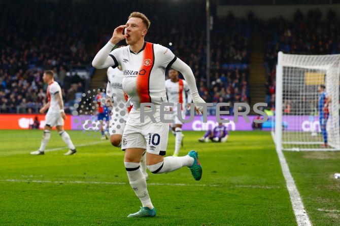 Luton Town's Cauley Woodrow celebrates scoring the equiser against Crystal Palace at Selhurst Park, London 