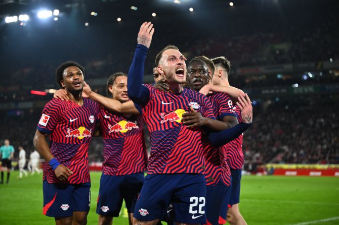 RB Leipzig players celebrate on scoring against Cologne