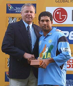 South African cricket legend Mike Proctor hands Sachin his Man of the Match trophy after the Pakistan game