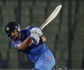 WT20 warm-up: Raina, Kohli propel India to a competitive total
