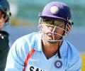 Dhoni asked to change gloves