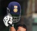 Tendulkar double, Raina debut ton as India rule