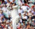 Three late Ajmal wickets halt England