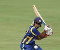 Jayawardene, Umesh steer Delhi into play-offs