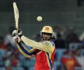 Gayle hits first ton of season, keeps RCB in playoffs hunt