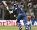 Karthik, Rohit shine as Mumbai hand Delhi third defeat