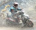 PHOTOS: Scooterists reign in the dirt and rain!