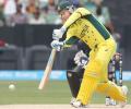 Clarke scores half-century on return as Australia rout UAE