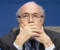 What prompted outgoing FIFA chief Blatter to quit?