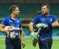England beat Afghanistan in rain-swept Sydney