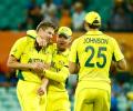 Australia knock defending champs India out of World Cup