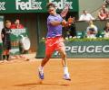 French Open PHOTOS: Federer breezes through first round