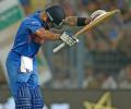 PHOTOS: Kohli bows before 'God of cricket'
