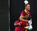 Simmons, Russell lead West Indies to shock win over India