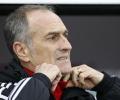 Swansea boss Guidolin still in hospital