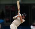 PHOTOS: Rain ends play early but New Zealand in control
