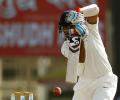 PHOTOS: Patient Pujara helps India narrow deficit after Cummins blows