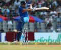 Dhoni unperturbed by calls to quit