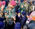 PICS: Lt Co. Dhoni's surprise visit to Army Public School in Srinagar