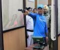 First Look: Dhoni goes shooting after practice washed out