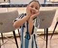 Messi Signs A Jersey For Ziva Dhoni