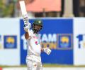 Shafique's century keeps Pakistan on course in big chase