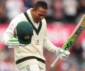 Australia's Khawaja flies to India after visa approved