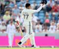 Gill's ton stuns England - but his socks may cost him
