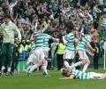 Celtic break Hearts late to snatch record 56th title