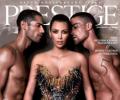 Kim Kardashian poses with nude men for mag cover