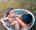 Your summer pics: Kids in a tub